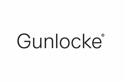 A black and white photo of the logo for gunlocke.